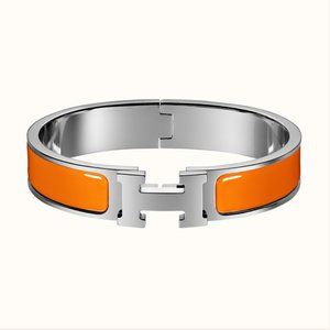 Hermes Clic H Bracelet in Orange/Silver